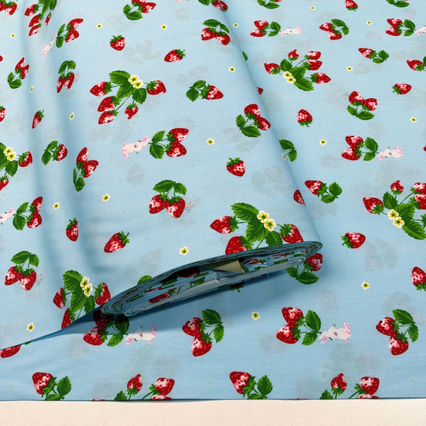 Bolt of Bunnies and Strawberries cotton fabric by Cosmo Textiles in blue and red, SP2600 1C