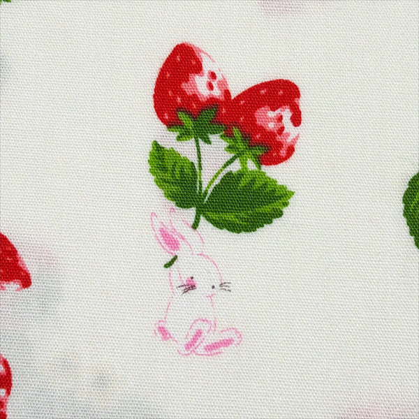 Close up of Bunnies and Strawberries cotton fabric by Cosmo Textiles in white and red, SP2600 1A