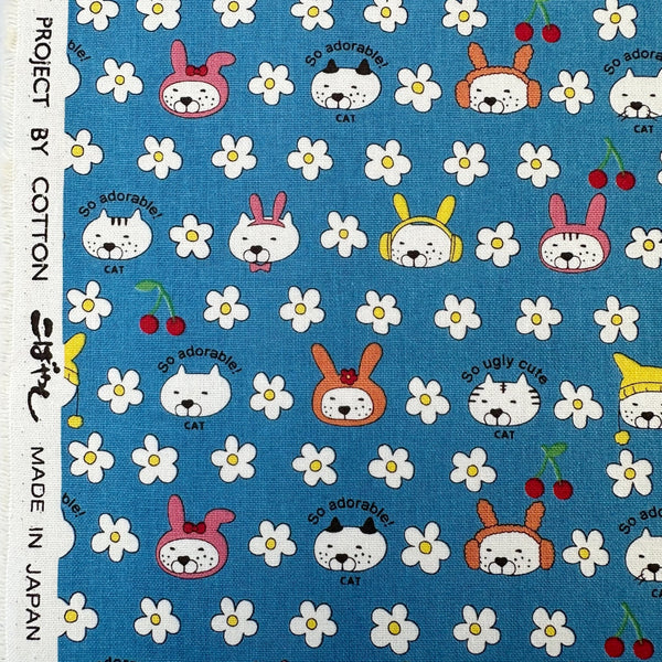Selvage of Bunny Cat cotton canvas fabric by Cotton Kobayashi in blue