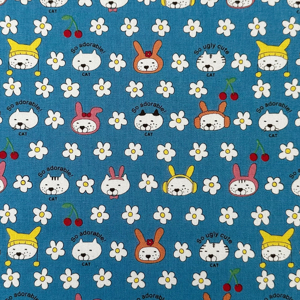 Bunny Cat cotton canvas fabric by Cotton Kobayashi in blue