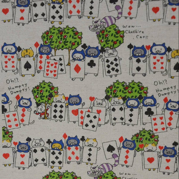 Close up of Card Guard Cats canvas fabric in natural featuring cats dressed as playing card guards by Cotton Kobayashi