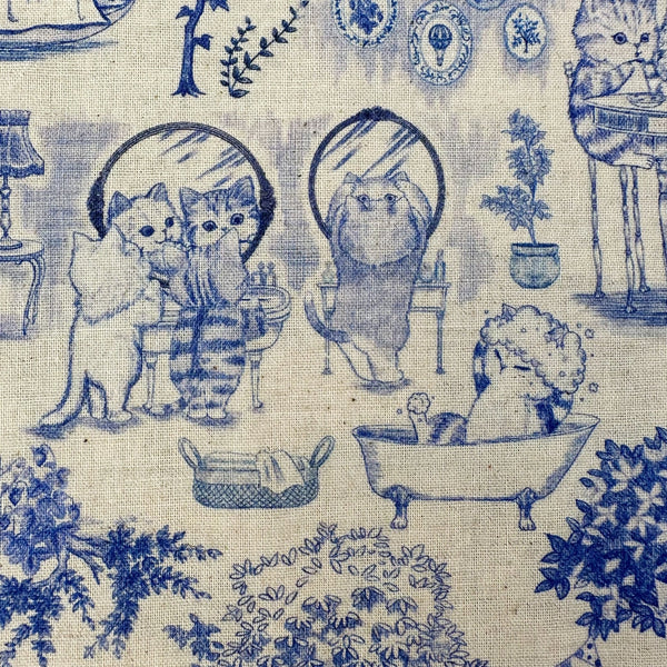Bathtub scene in Cat Garden Cotton Linen Fabric by Yukiemon for Hokkoh, featuring toile-style cat illustrations, imported from Japan