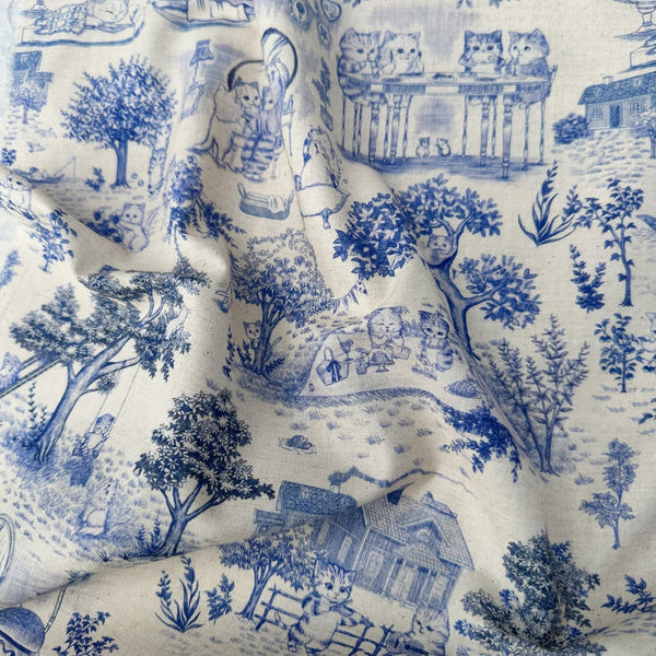 Drape of Cat Garden Cotton Linen Fabric by Yukiemon for Hokkoh, featuring toile-style cat illustrations, imported from Japan