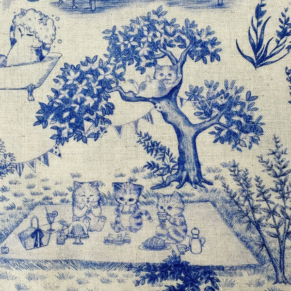 Picnic scene in Cat Garden Cotton Linen Fabric by Yukiemon for Hokkoh, featuring toile-style cat illustrations, imported from Japan