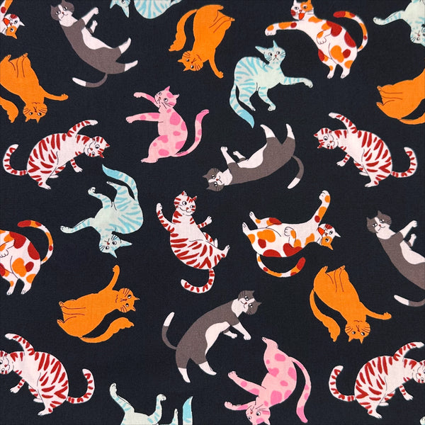 Cat Punch cotton broadcloth fabric in black by Sevenberry, Japanese import featuring playful cat print