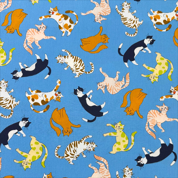 Cat Punch cotton broadcloth fabric in blue by Sevenberry, Japanese import featuring playful cat print