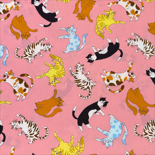 Cat Punch cotton broadcloth fabric in pink by Sevenberry, Japanese import featuring playful cat print