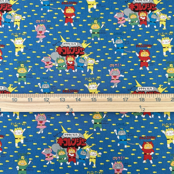 Scale of Cat Ranger cotton canvas fabric by Cotton Kobayashi in blue
