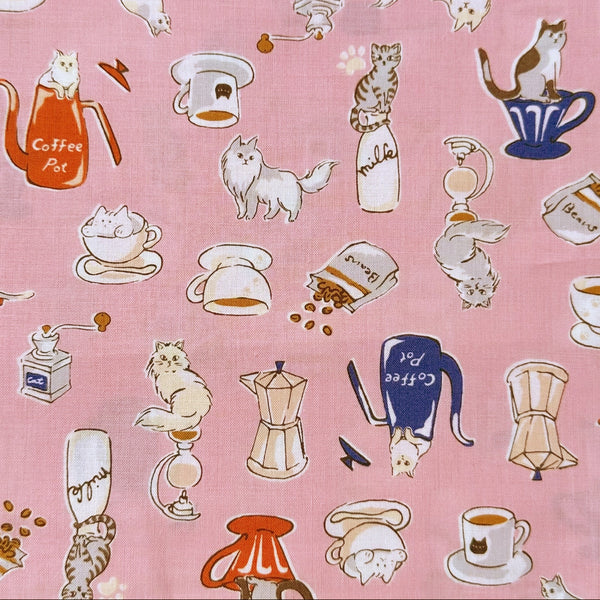 Cat and Coffee cotton fabric by Handworks featuring playful cats and coffee-themed illustrations on a pink background