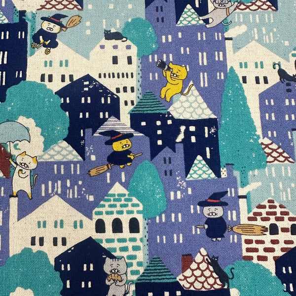 Close up of Cats Emergency Landing Cotton Linen Canvas fabric by Cotton Kobayashi, style KTS-7204 B, in blue