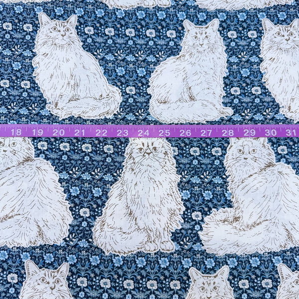 Scale of Cats Playground cotton fabric in blue by Handworks Japan featuring large-scale cats on a petite floral background