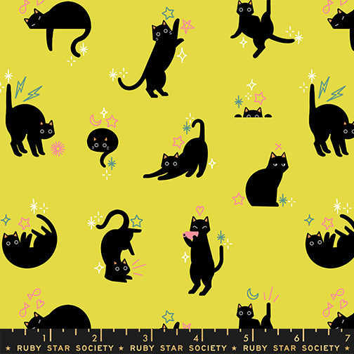 Catwalk cotton fabric by Ruby Star Society featuring cats and stars on a citron background.