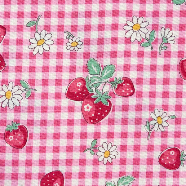 Close up of Check and Strawberry cotton fabric by Yuwa in pink, AT829949 A