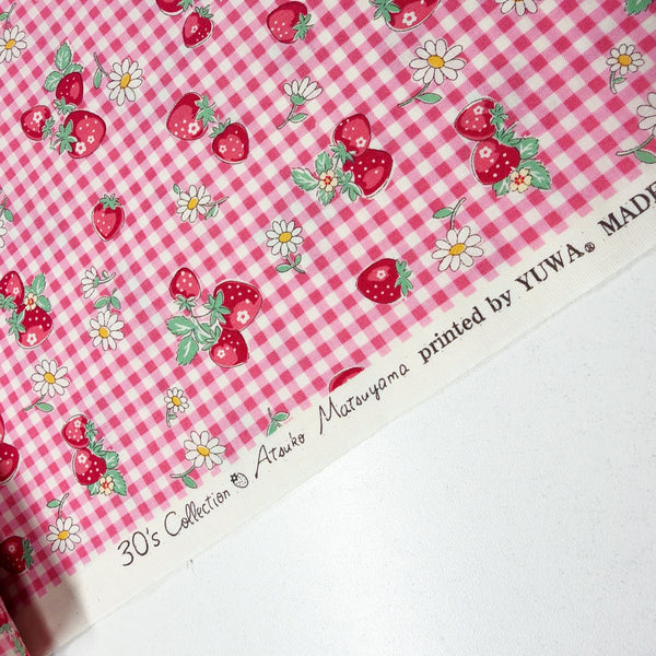 Selvage of Check and Strawberry cotton fabric by Yuwa in pink, AT829949 A
