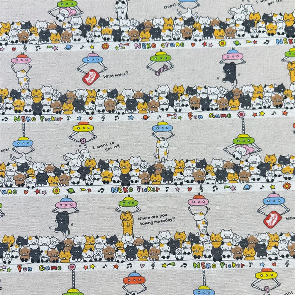 Claw Machine Cats canvas fabric in natural by Cotton Kobayashi, cotton linen blend with whimsical cat claw machine print