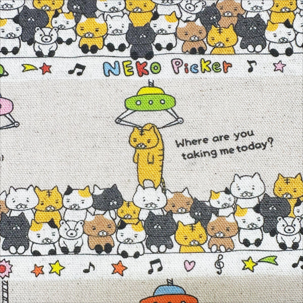 Close up of Claw Machine Cats canvas fabric in natural by Cotton Kobayashi, cotton linen blend with whimsical cat claw machine print