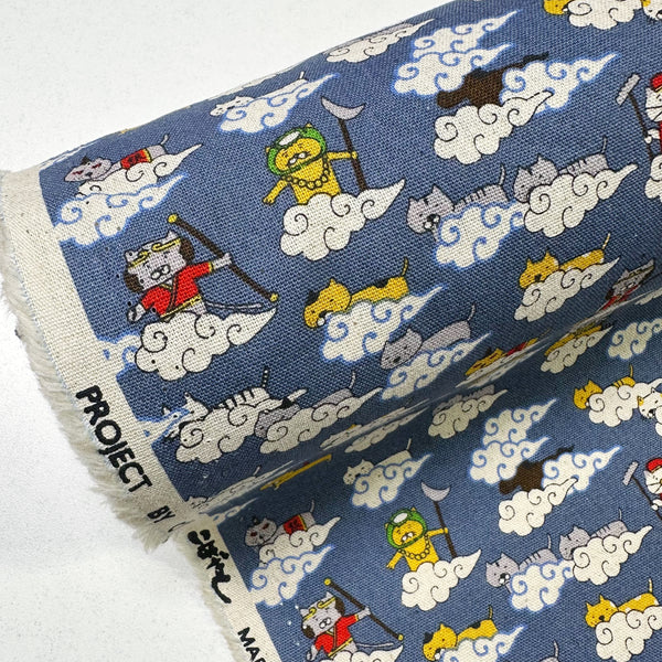 Bolt of Cloud Cats canvas fabric in steel cotton linen blend by Cotton Kobayashi featuring silly cats hanging out in clouds