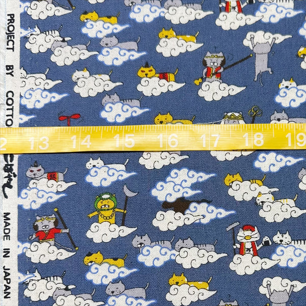 Scale of Cloud Cats canvas fabric in steel cotton linen blend by Cotton Kobayashi featuring silly cats hanging out in clouds
