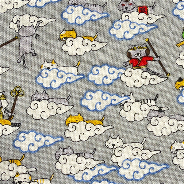 Close up of Cloud Cats cotton linen canvas fabric by Cotton Kobayashi in gray
