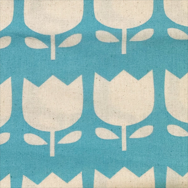 Close up of Color Palette Tulips cotton fabric in blue, Japanese import with cheerful tulip print on blue background