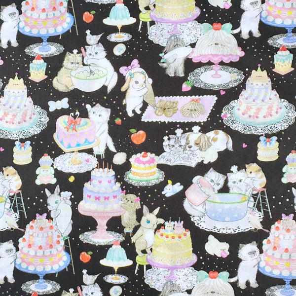 Cook Cats cotton lawn fabric in black by Yukiemon for Hokkoh featuring adorable animals baking cakes and preparing sweet treats, imported from Japan