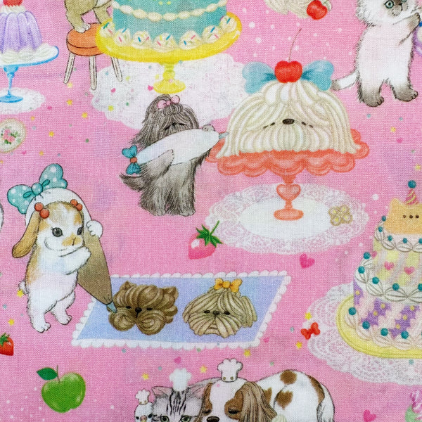 Decorating Cook Cats cotton lawn fabric by Yukiemon for Hokkoh featuring adorable animals baking cakes and preparing sweet treats, imported from Japan