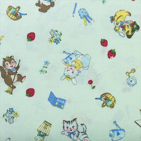 Close-up of Tiny Animals mint cotton fabric from Atsuko Matsuyama Yuwa 30’s Collection, perfect for quilting and crafts.