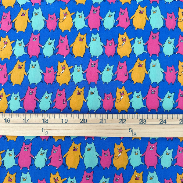 Scale of Dancing Pigs Cotton Broadcloth Fabric by Sevenberry, style B850618Z, featuring dancing pigs, in blue, imported from Japan