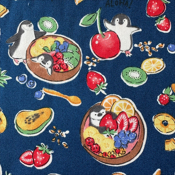 Close up of Delicious Animals Acai Bowl Penguin cotton oxford fabric by Kokka in blue, style YGA-91070-2D