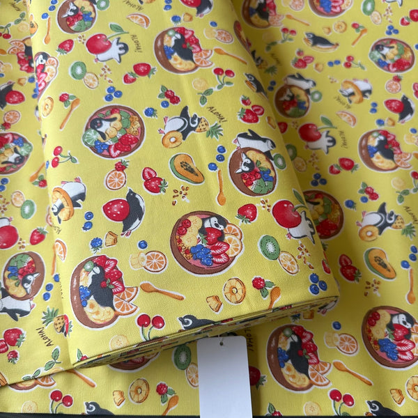 Bolt of Delicious Animals Acai Bowl Penguin cotton oxford fabric by Kokka in yellow, style YGA-91070-2C