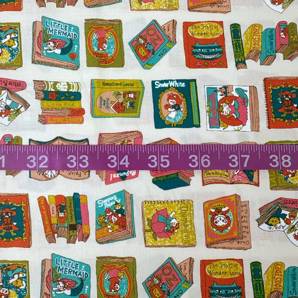 Scale of Dreaming Cat Story Books cotton fabric in ivory, imported from Japan