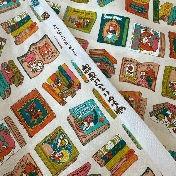 Selvage of Dreaming Cat Story Books cotton fabric in ivory, imported from Japan