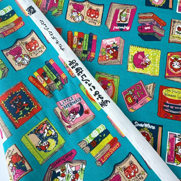 Selvage of Dreaming Cat Story Books cotton fabric in teal, imported from Japan