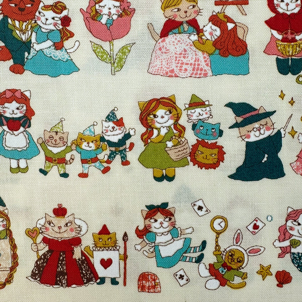 Close up of Dreaming Cat Story Characters cotton fabric in Ivory, imported from Japan