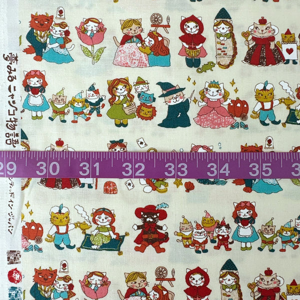 Scale of Dreaming Cat Story Characters cotton fabric in Ivory, imported from Japan