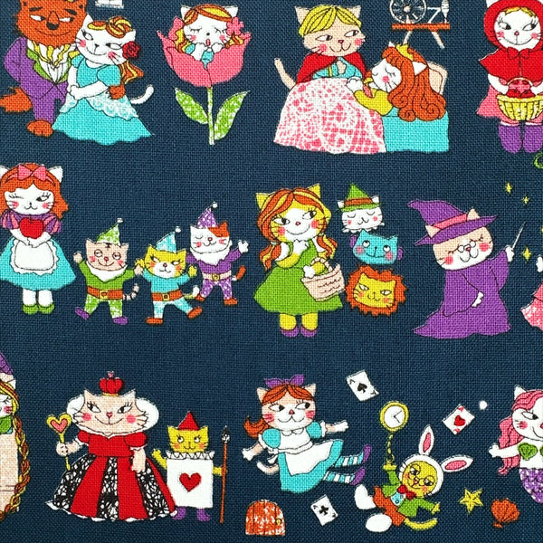 Close up of Dreaming Cat Story Characters cotton fabric in navy, imported from Japan