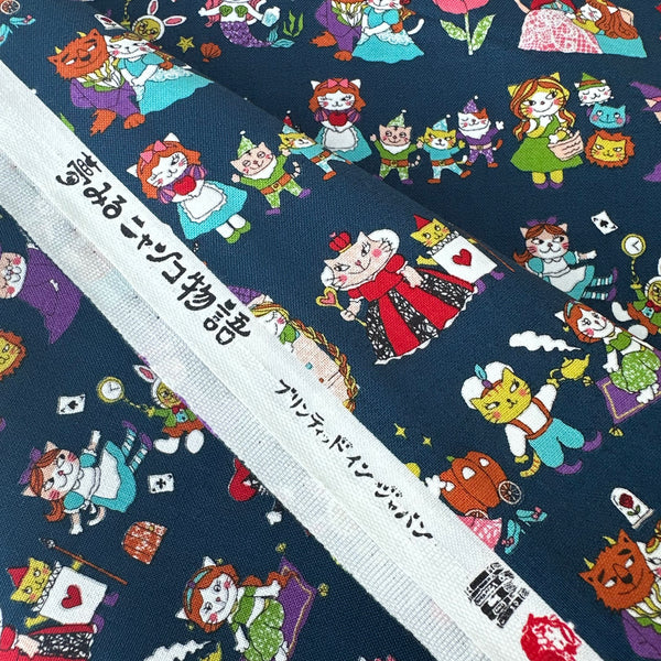 Selvage of Dreaming Cat Story Characters cotton fabric in navy, imported from Japan