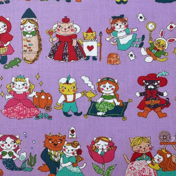 Close up of Dreaming Cat Story Characters cotton fabric in purple, imported from Japan