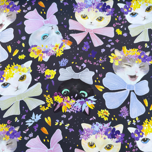 Dressed Up Cats cotton fabric in purple by Nora featuring cats with ribbons and flower crowns imported from Japan