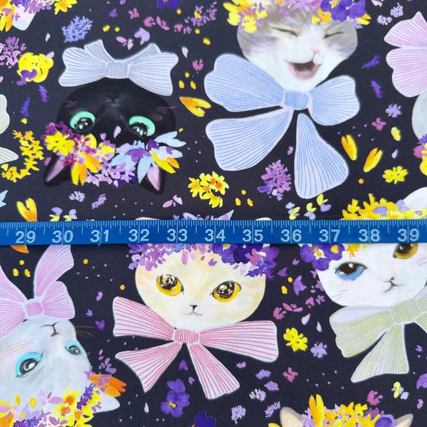 Scale of Dressed Up Cats cotton fabric in purple by Nora featuring cats with ribbons and flower crowns imported from Japan