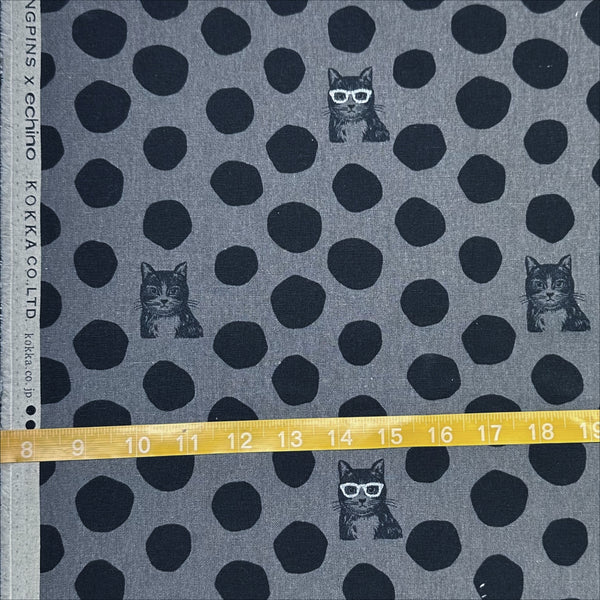 Scale of Echino Nekonoe Cat Cotton Linen Canvas Fabric by Etsuko Furuya for Kokka Japan, featuring cat portraits and polka dots in charcoal and black