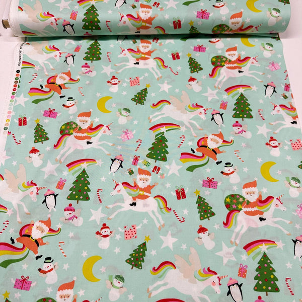 Yuletide Unicorn Cotton Fabric by Alexander Henry, 8894 B Christmas Santa Rainbows