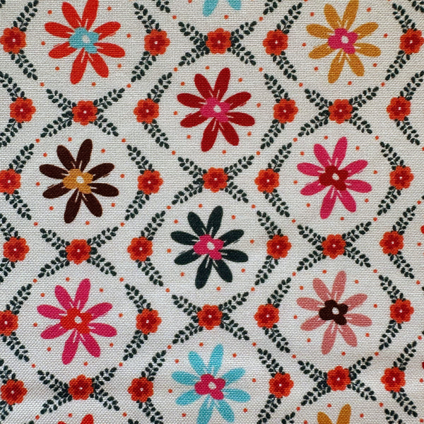 Close up of Fine Folk Daisy Chain cotton fabric by Helen Black, style FOLK1118
