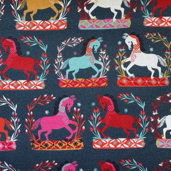Close up of Fine Folk Prancing Horses cotton fabric by Helen Black, style FOLK1112