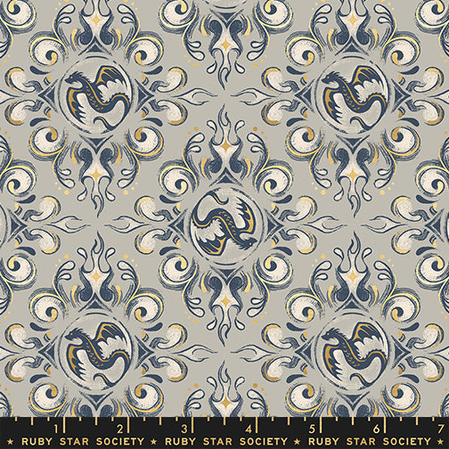 Scale of Fireglow Emblem in Oyster cotton fabric by Sarah Watts for Ruby Star Society featuring dragon emblems and metallic accents