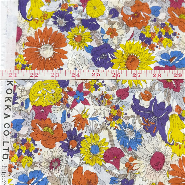 Scale of Flownny I floral cotton lawn fabric in white by Kokka