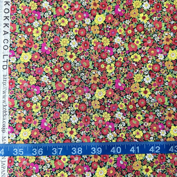 Scale of print - Flownny Retro Floral cotton lawn fabric by Kokka in black multi, style NFA-1030-31 F