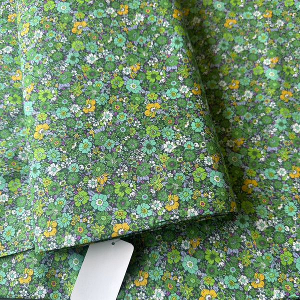 Bolt of Flownny Retro Floral cotton lawn fabric by Kokka in green, style NFA-1030-31 D