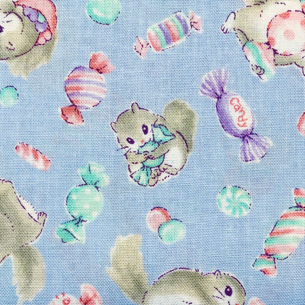 Close up of Flying Squirrels and Candy cotton fabric by Cosmo Textiles in periwinkle blue, AP55203 2C