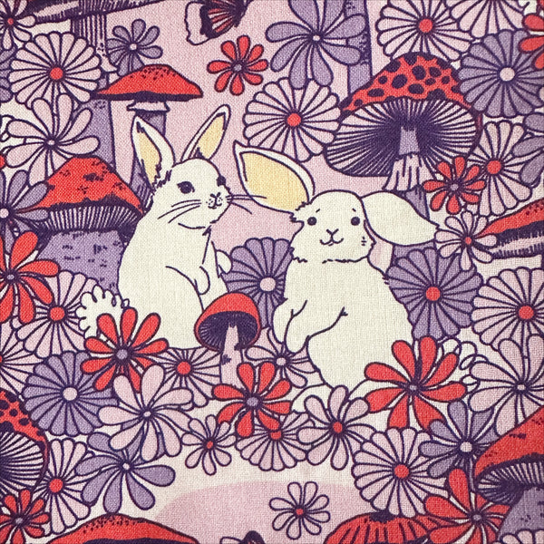 Close up of Forest Friends Mushroom Bunnies Cotton Fabric by The Good Twin for Cloud 9 Fabrics, 100% organic cotton.